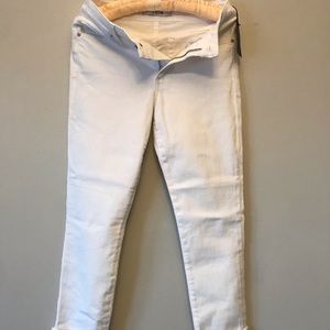 White cuffed jeans. 33” in length